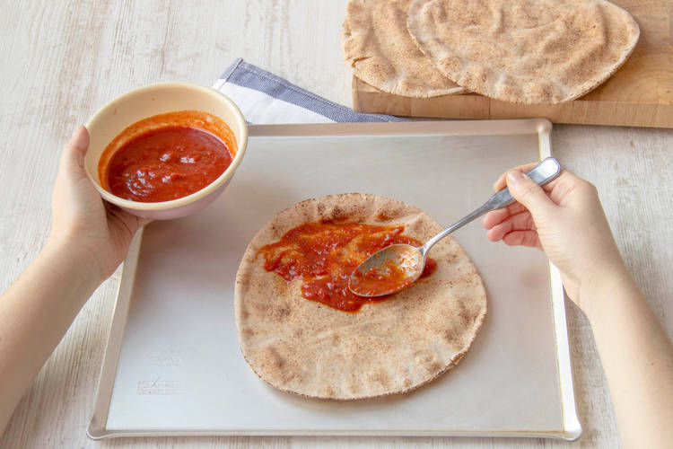 Spread pizza sauce