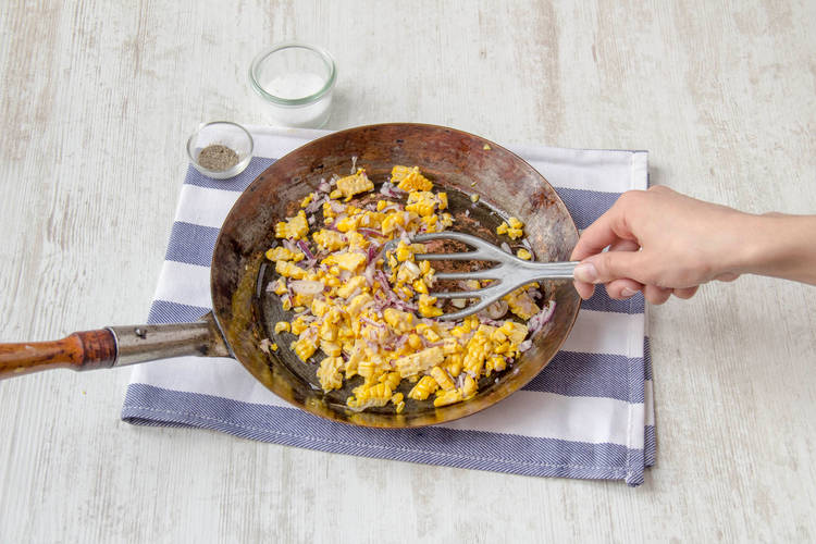 Cook corn and onion
