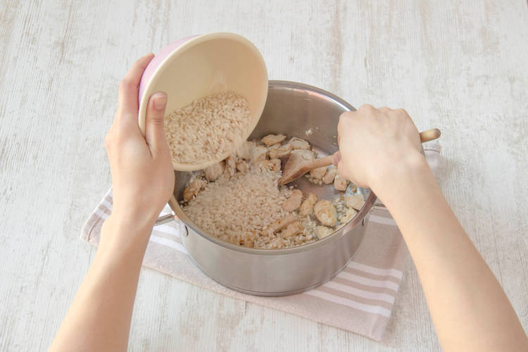 Toast the arborio rice in the pan