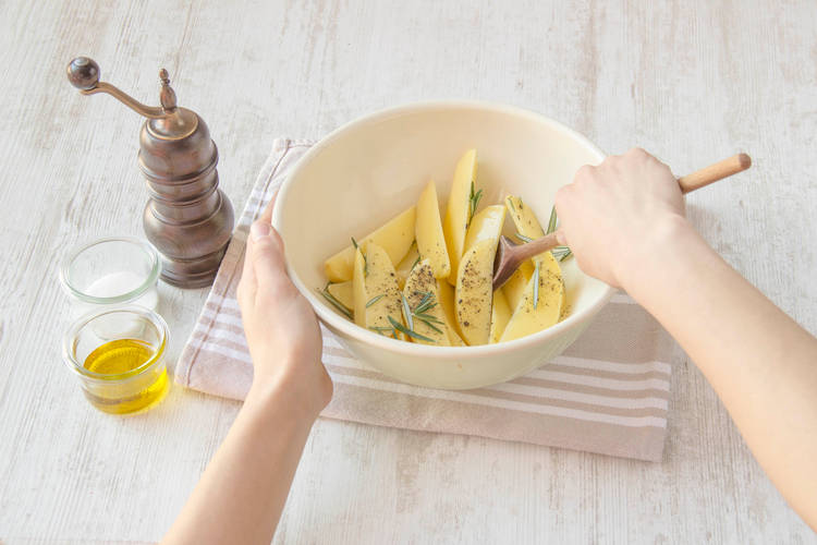 Toss the potatoes in oil