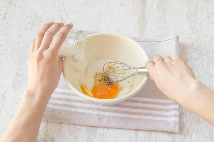Mix egg and milk together