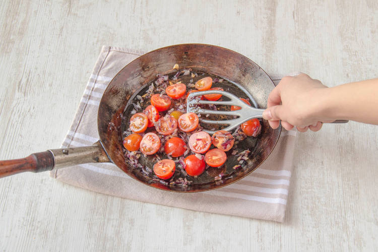Chop and fry cherry tomatoes