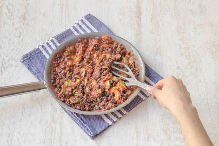 Mix the beans with the tomato passata and the jalapeños