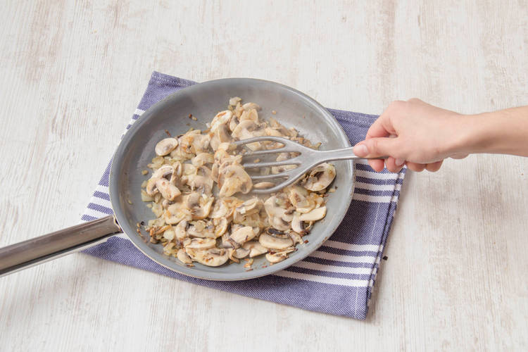 Cook the mushrooms with the onion and the garlic until soft