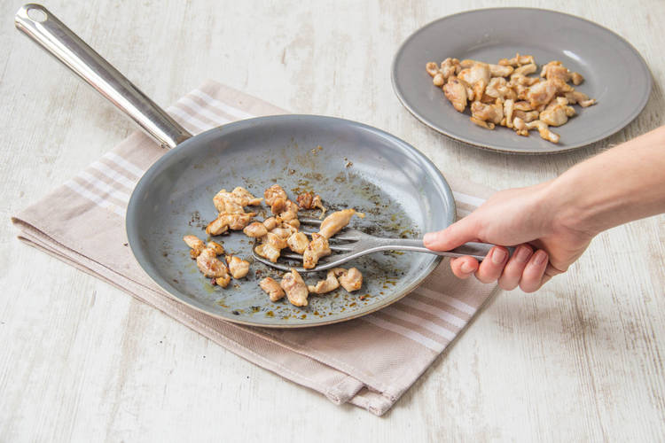 Cook your chicken for a couple of minutes to brown it off.