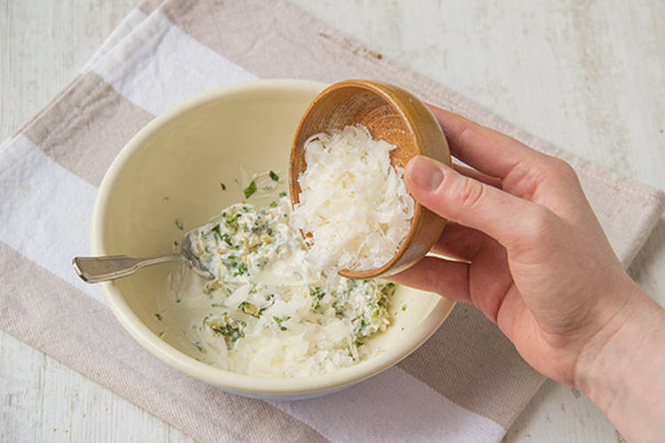 Mix crème fraîche with pine nuts and basil