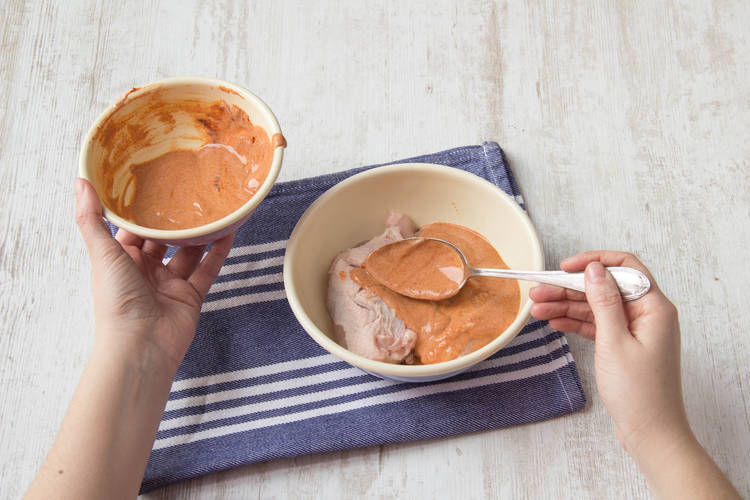 Marinade chicken breast with mixture of spice blend and yoghurt