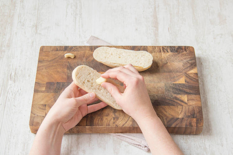Rub the baguette with garlic