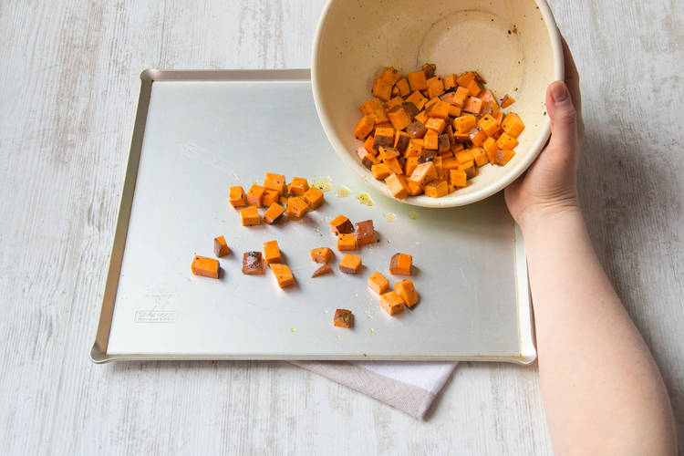 Toss on the baking sheet