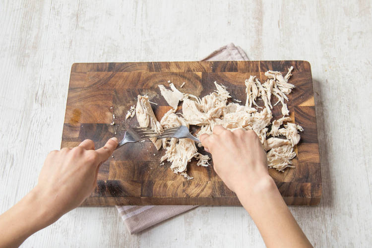 Fleisch mit Gabeln schredden