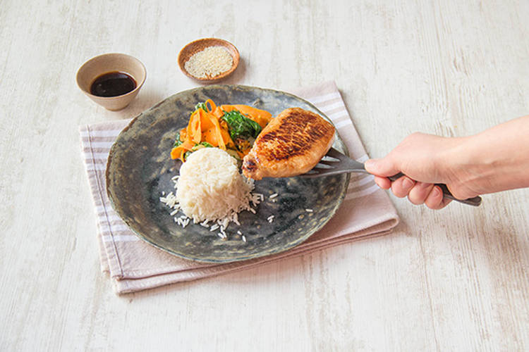 Serve the steaks with rice and veggies