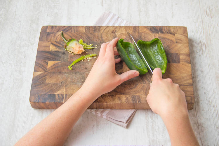Halve the poblano pepper