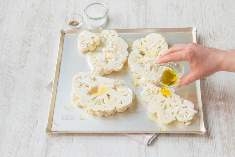 Oil the cauliflower steaks