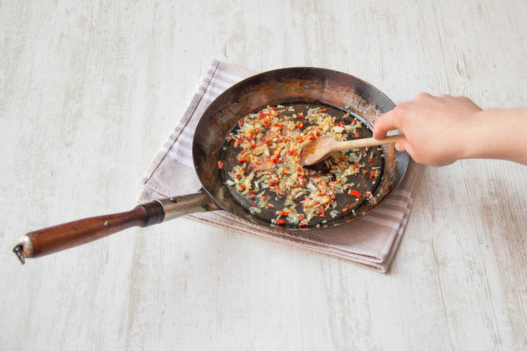 Add the garlic and chilli to the pan