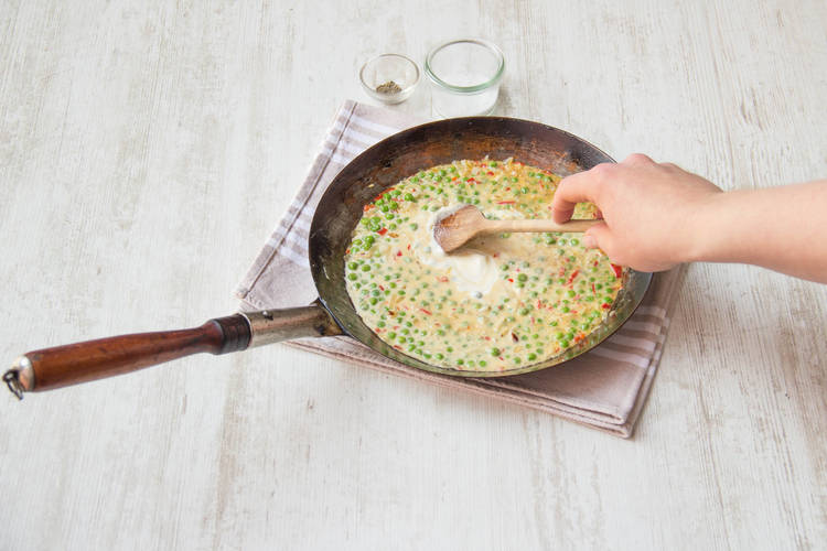 Stir through half the tub of crème fraîche