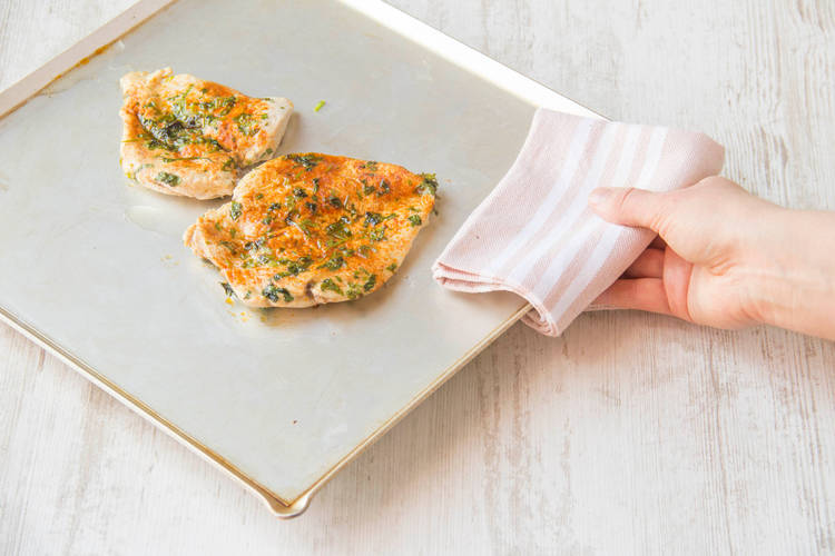 Cook the chicken breasts, sprinkled with paprika and lime zest