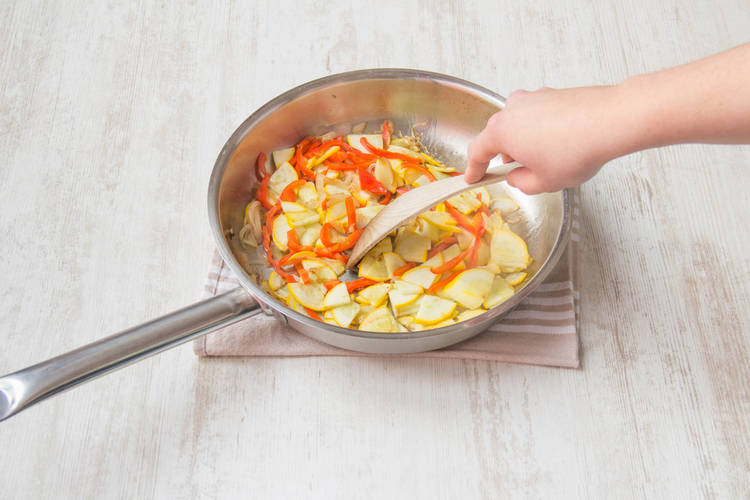 Add the squash and bell pepper to the onion mix