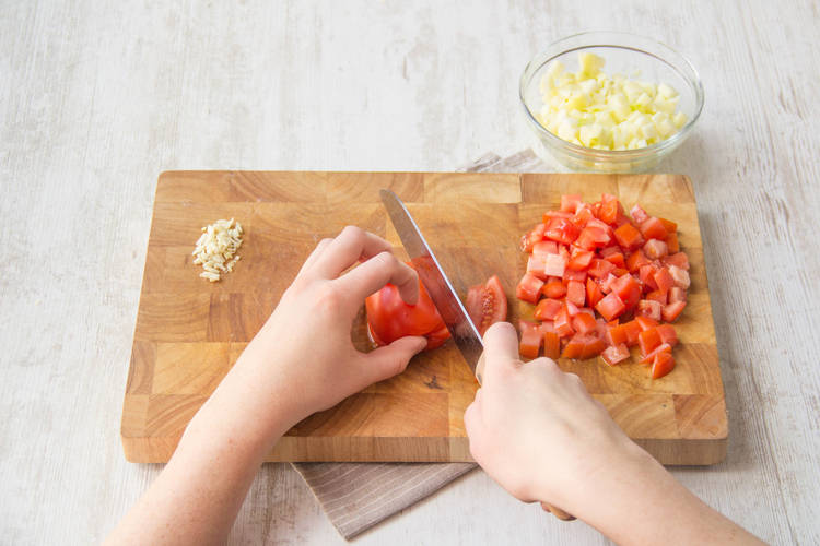 Chop the tomatoes into 1cm cubes