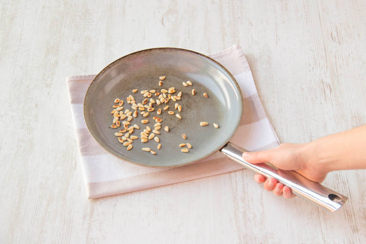 Toast the pine nuts