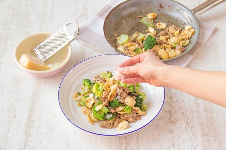 Add pasta and vegetables to the pork