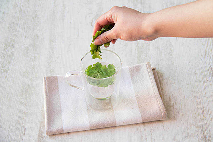 Blanch parsley in boiling water