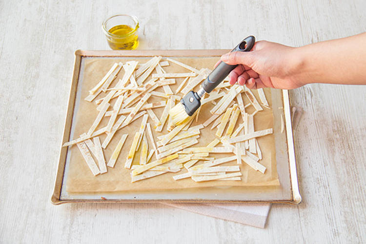 Brush the tortillas with the olive oil