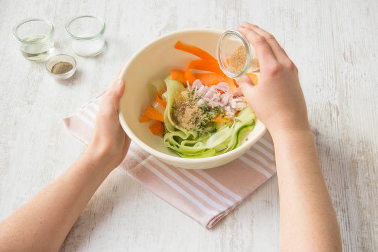 Toss cucumber and carrot salad