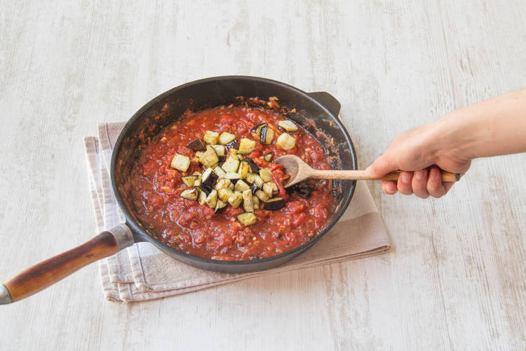 Add aubergine to sauce