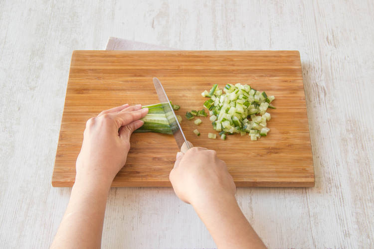 Chop cucumber into tiny cubes