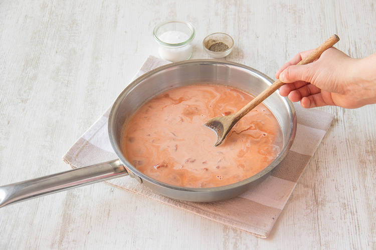 Simmer coconut milk, tinned tomatoes, grated ginger and chilli flakes