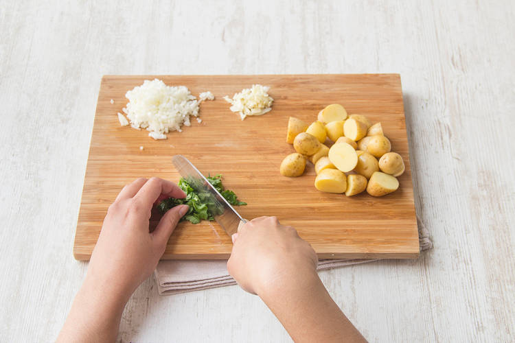 Chop onion, garlic, new potatoes and coriander