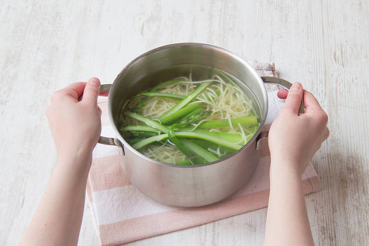Put noodles and asparagus back into pot with cold water