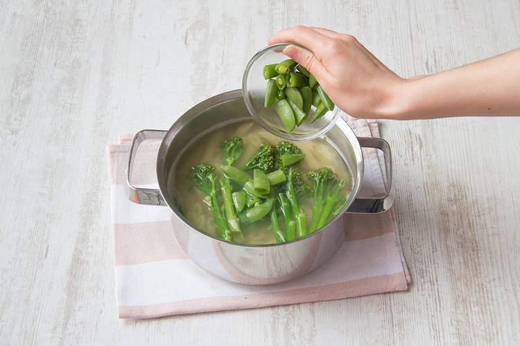 Add sugar snap peas to pasta