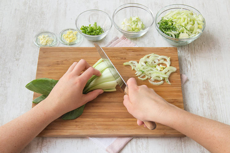 Finely slice bok choy
