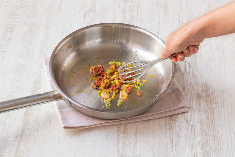 Add red curry paste