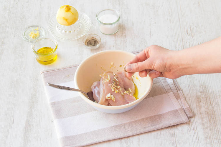 Mix the chicken with olive oil and diced garlic