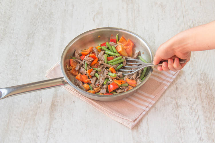 Add green beans and red pepper