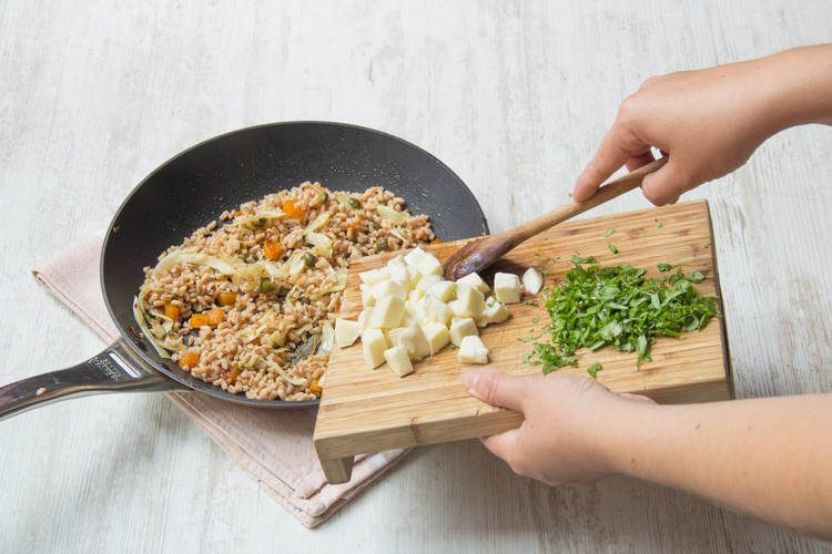 Add the wheat berries, mozzarella, and basil