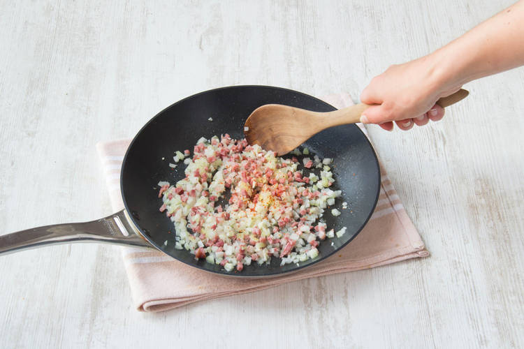 Cook pancetta, onion, garlic and chilli flakes