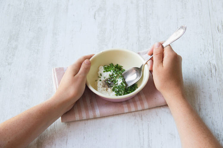 Mix together your chives and sour cream