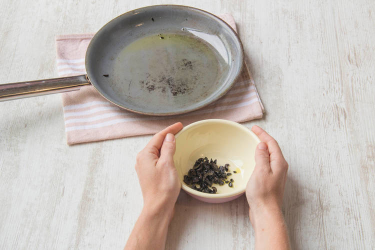 Cook the olives and remove from the pan