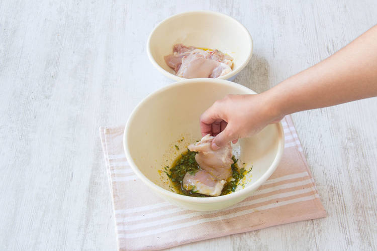 Add the chicken to the chermoula