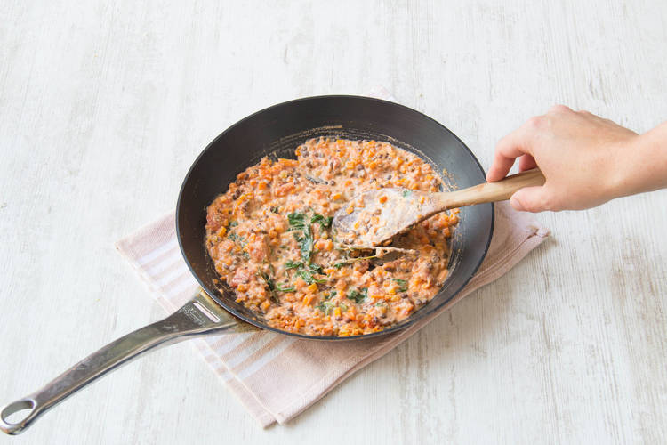 Add the ricotta to the pan