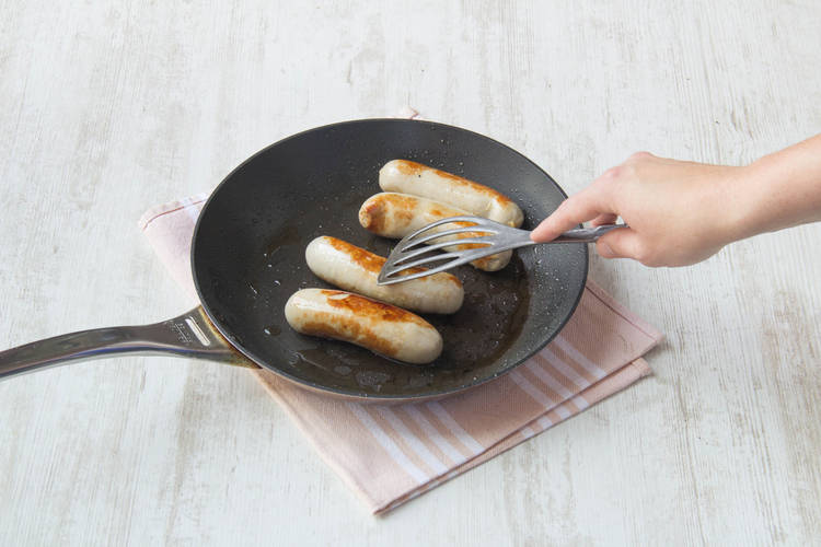 Cook the chicken sausages