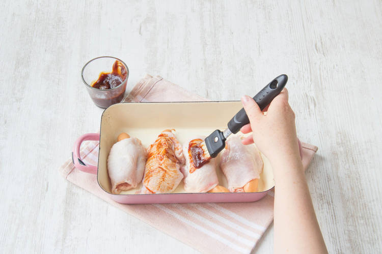 Put hoisin sauce on the chicken