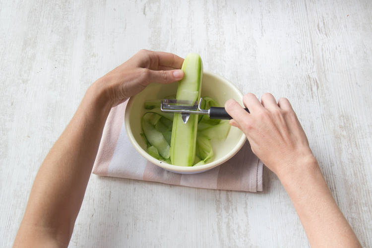 Peel your cucumber