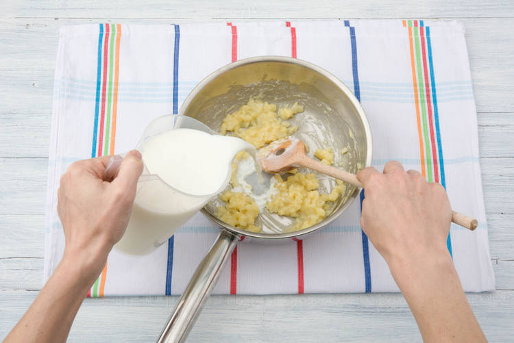 Add the milk to the pan
