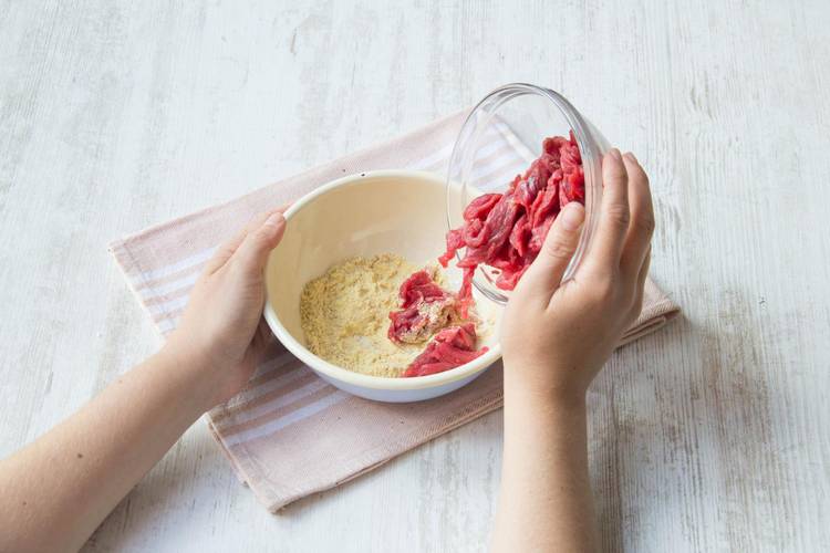 Add the steak to the cornflour mixture