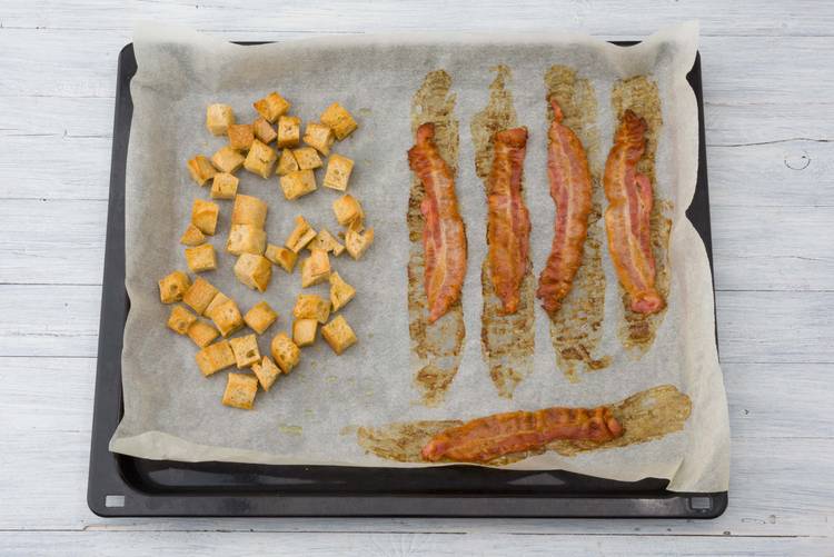 Cook the bacon and baguette cubes