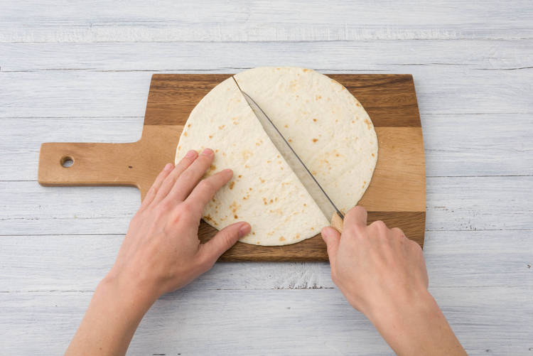 Cut tortillas in half